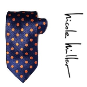 Nicole Miller 100% silk indigo blue mens tie with orange polka-dots.